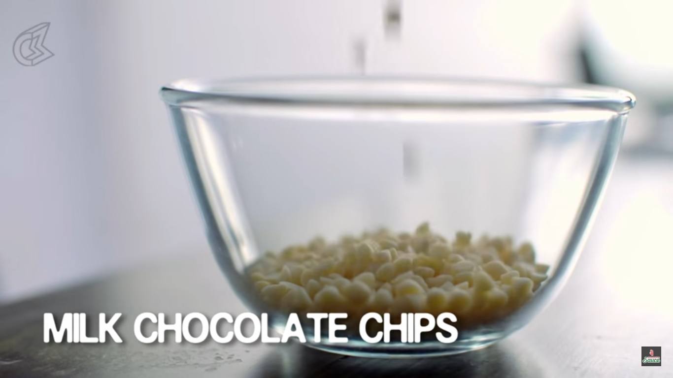 Take some white chocolate chips in a bowl.